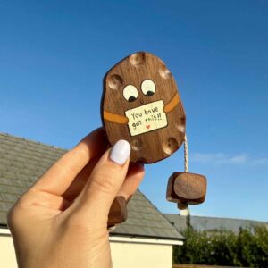 Positivity Potato - wooden potato holding a sign saying 'you have got this'
