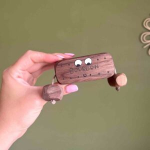 wooden Bourbon Biscuit made from walnut with face and arms