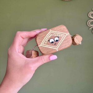 Wooden custard cream biscuit in oak. with face and arms