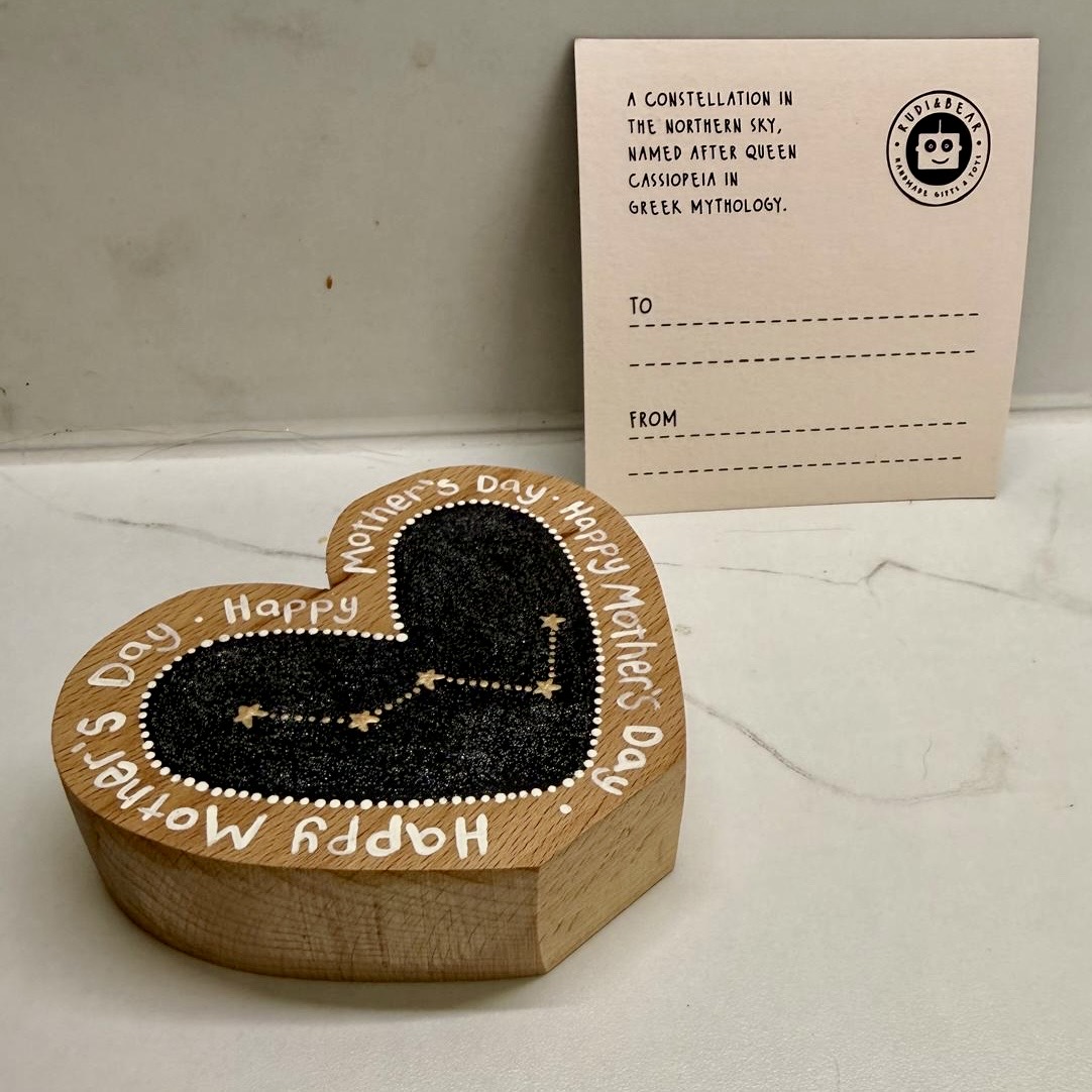 Hand-painted wooden Mother’s Day heart featuring the Cassiopeia constellation in oak with matching gift card by Rudi & Bear.